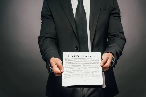 Cropped View African American Businessman Showing Contract Dark Background — Stock Photo, Image