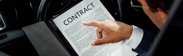 Cropped View African American Businessman Suit Reading Contract Car Sunny — Stock Photo, Image