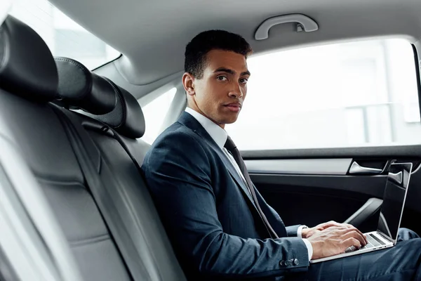 Handsome African American Businessman Using Laptop Car — Stock Photo, Image