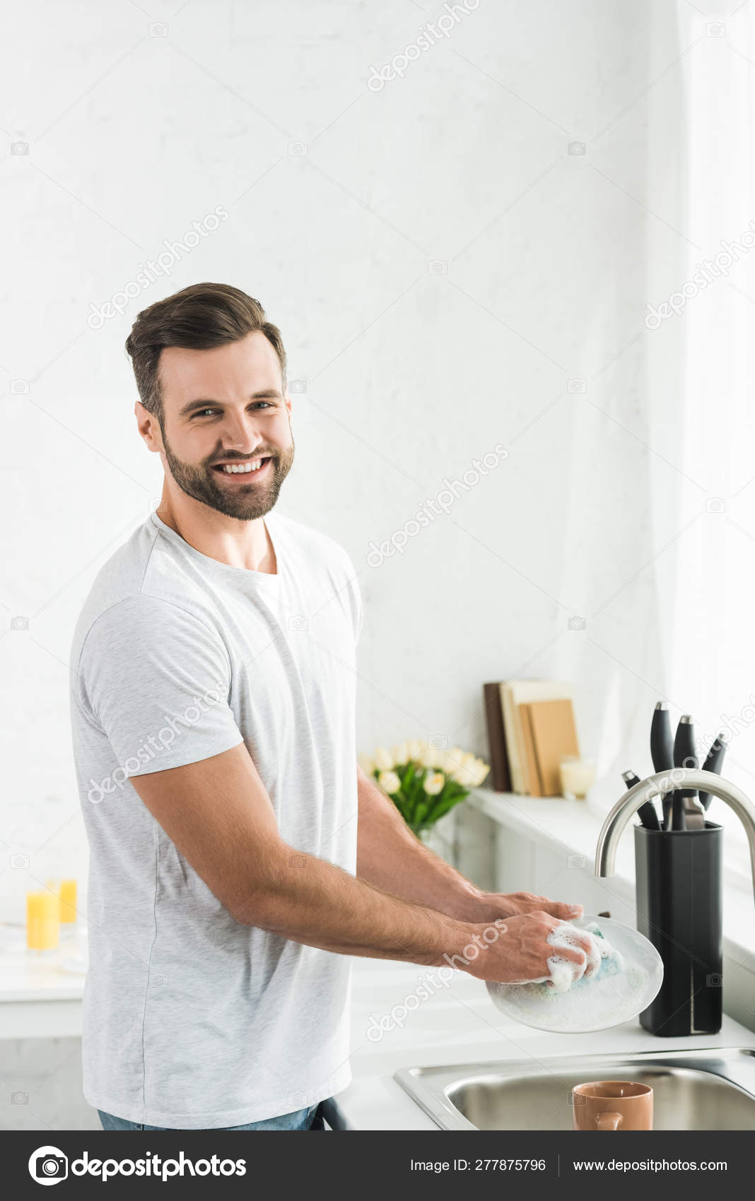 Handsome Smiling Man Washing Dishes Kitchen Morning Stock Photo by ©IgorVetushko 277875796