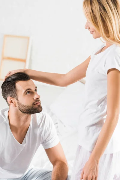 Woman Pajamas Stroking Handsome Man Bedroom — Stock Photo, Image