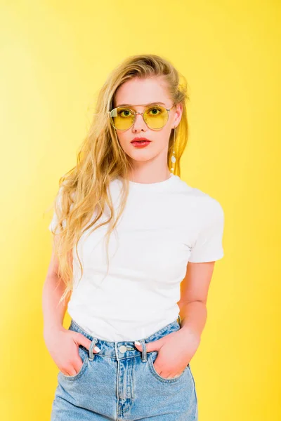 Beautiful Girl Sunglasses Hands Pockets Looking Camera Yellow — Stock Photo, Image