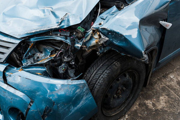 selective focus of crashed automobile after car accident 
