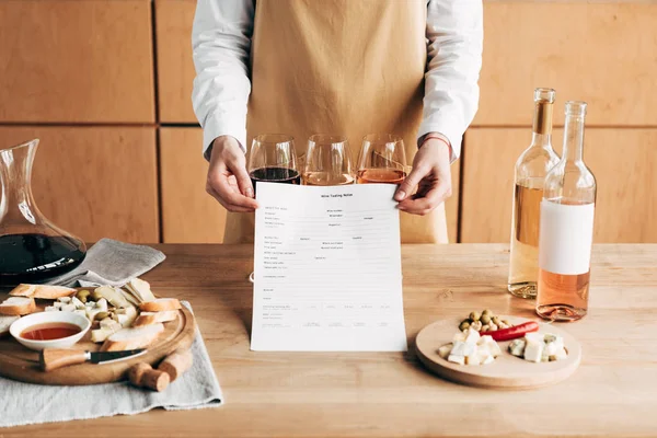 Cropped View Sommelier Apron Holding Wine Tasting Notes — Stock Photo, Image