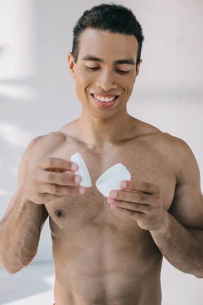 Handsome Mixed Race Man Opening Container Cosmetic Cream — Stock Photo, Image