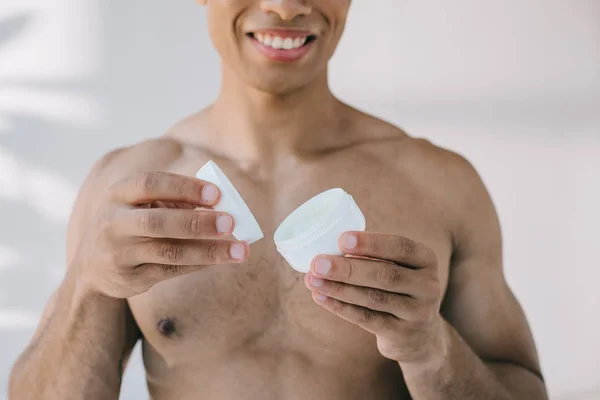 Cropped View Handsome Mixed Race Man Opening Container Cosmetic Cream — Stock Photo, Image