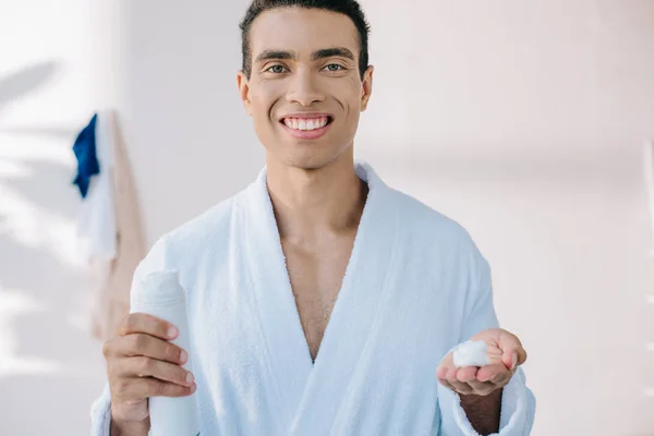 Handsome Man Bathrobe Holding Dispenser Shaving Cream Smiling Looking Camera — Stock Photo, Image