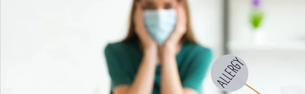 Panoramic Shot Woman Medical Mask Propping Face Hands Nameplate Inscription — Stock Photo, Image