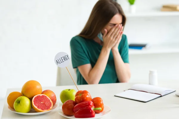 Woman Medical Mask Sneezing While Sitting Table Fruits Vegetables Pills — Stock Photo, Image