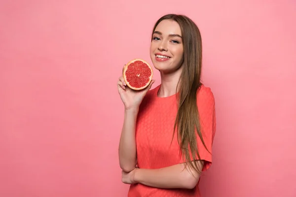 Attractive Smiling Young Woman Holding Cut Grapefruit Looking Camera Pink — Stock Photo, Image