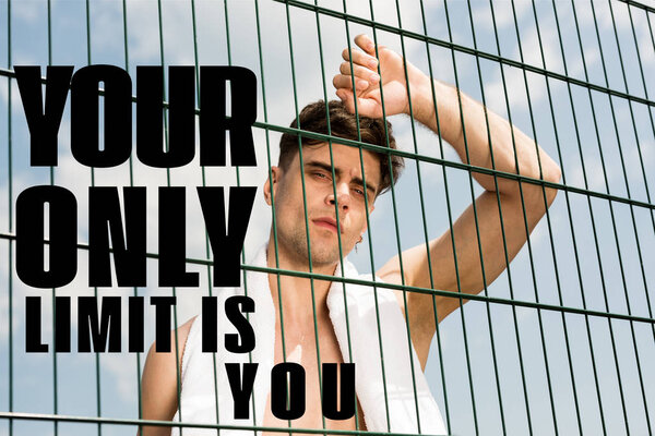 your only limit is you lettering on photo of tired shirtless sportsman with towel standing behind lattice 