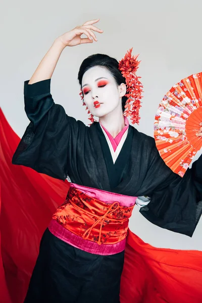 Beautiful Geisha Black Kimono Hand Fan Dancing Red Cloth Background — Stock Photo, Image