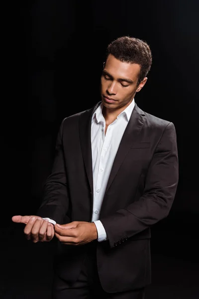 Mixed Race Man Standing Touching Suit Isolated Black — Stock Photo, Image