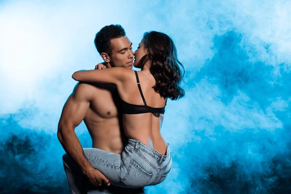 Shirtless Mixed Race Man Holding Arms Sexy Woman Jeans Blue — Stock Photo, Image