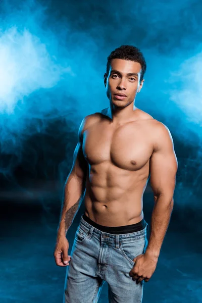Sexy Mixed Race Man Standing Denim Jeans Looking Camera Blue — Stock Photo, Image