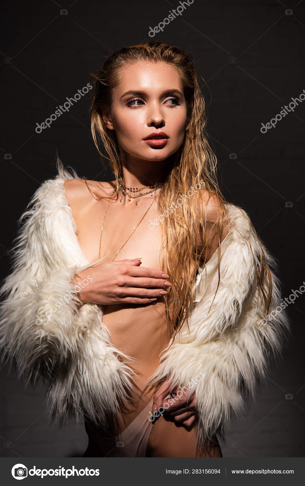 Sexy Naked Young Woman Wet Blonde Hair Hand Breast White Stock Photo by  ©IgorVetushko 283156094
