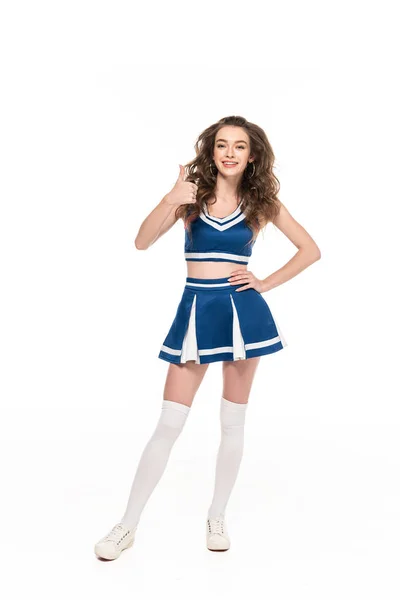 性感的微笑啦啦队长女孩在蓝色制服显示大拇指上孤立在白色 — 图库照片
