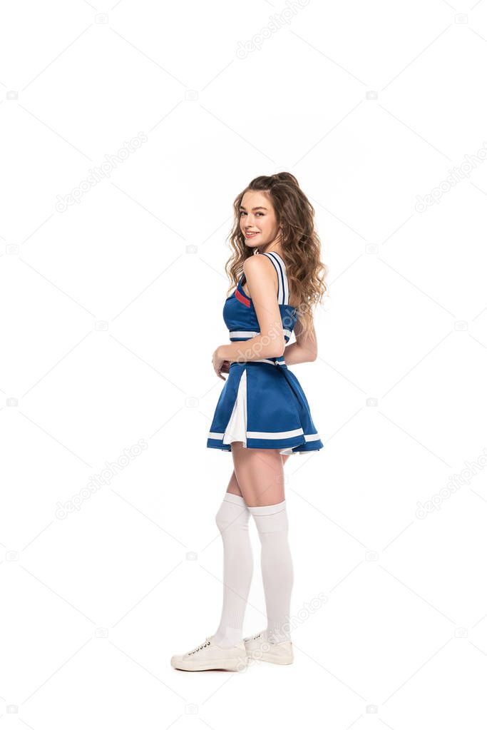 side view of sexy happy cheerleader girl in blue uniform isolated on white