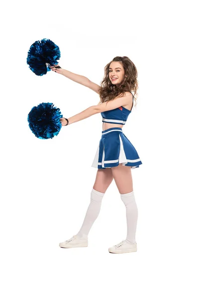 微笑的啦啦队长女孩在蓝色制服跳舞与白色隔离的庞然大意的全长视图 — 图库照片