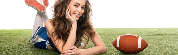 Smiling Cheerleader Girl Blue Uniform Lying Rugby Ball Green Field — Stock Photo, Image