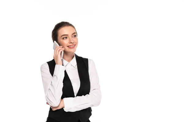 快乐的年轻女服务员谈论智能手机孤立在白色 — 图库照片