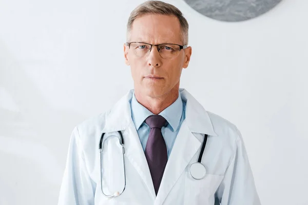 Handsome Doctor Glasses White Coat Looking Camera — Stock Photo, Image