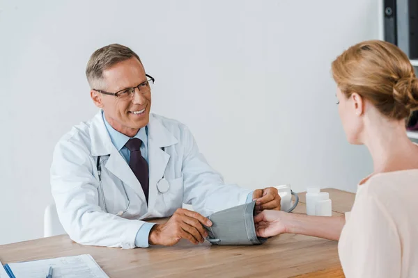 Selective Focus Happy Doctor Measuring Blood Pressure Woman — Stock Photo, Image