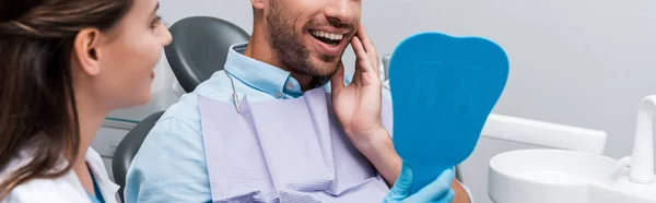 Panoramic Shot Woman Smiling Bearded Patient Touching Face While Holding — Stock Photo, Image