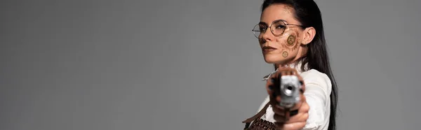 Panoramic Shot Confident Steampunk Woman Aiming Pistol Camera Isolated Grey — Stock Photo, Image