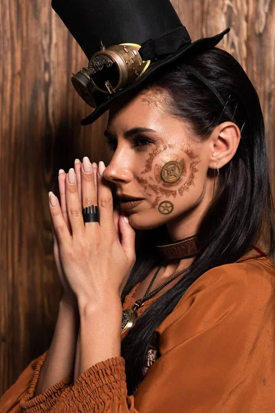 Pensive Steampunk Woman Showing Please Gesture Wooden — Stock Photo, Image