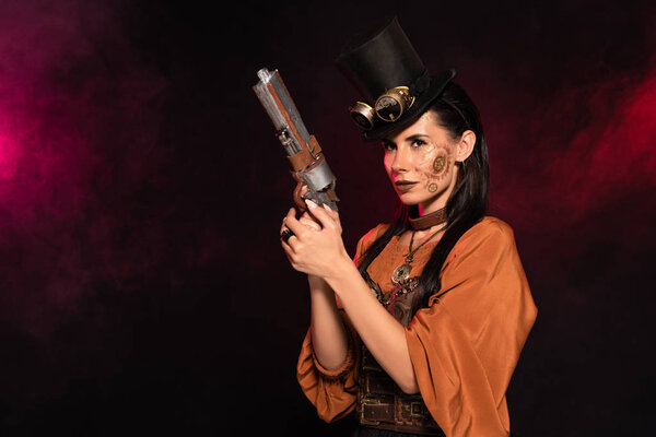 beautiful steampunk woman in top hat holding pistol in pink smoke