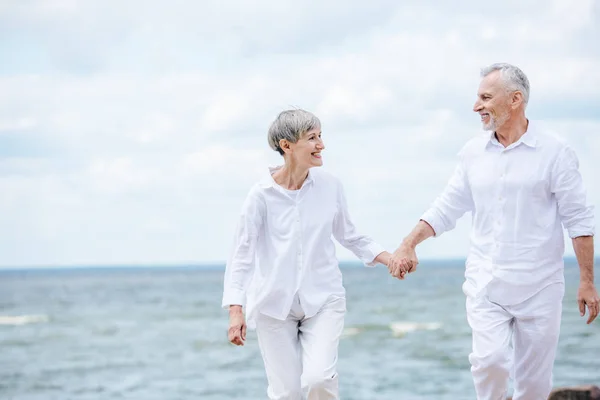 Happy Senior Couple Holding Hands Looking Each Other River — Stock Photo, Image