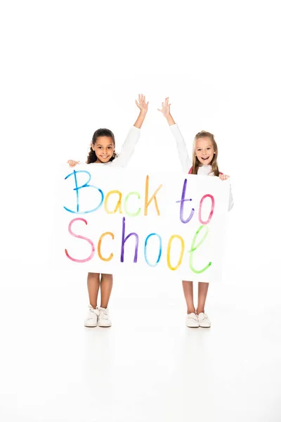 Two Cheerful Multicultural Schoolgirls Holding Placard Back School Inscription White — Stock Photo, Image