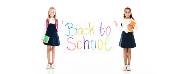 Panoramic Shot Two Cheerful Multicultural Schoolgirls Holding Placard Back School — Stock Photo, Image
