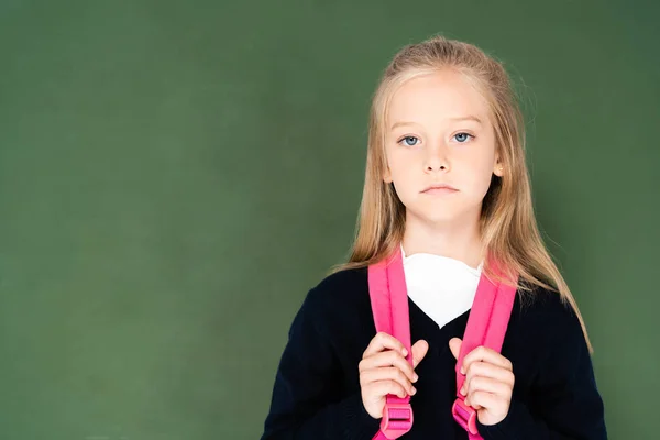 Sad Schoolgirl Looking Camera While Standing Green Chalk Board — Stock Photo, Image