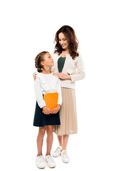 Happy Mother Standing Cheerful Daughter Holding Books Isolated White — Stock Photo, Image