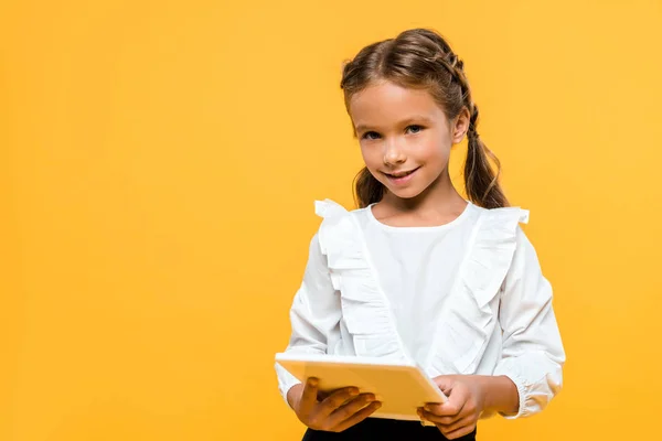 Happy Schoolchild Holding Book Isolated Orange — Stock Photo, Image