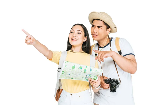 Two Cheerful Asian Tourists Pointing Fingers While Holding Map Isolated — Stock Photo, Image