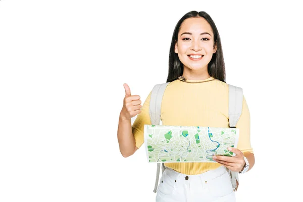 Cheerful Asian Girl Holding Map Showing Thumb Isolated White — Stock Photo, Image