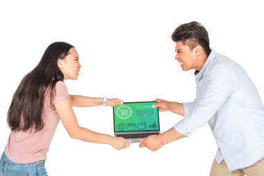 irritated asian man and woman holding laptop with shopping website on screen isolated on white clipart