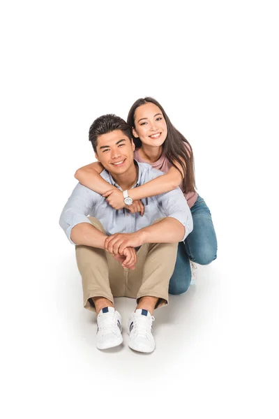 Feliz Asiático Chica Abrazando Novio Mientras Sentado Blanco Fondo —  Fotos de Stock
