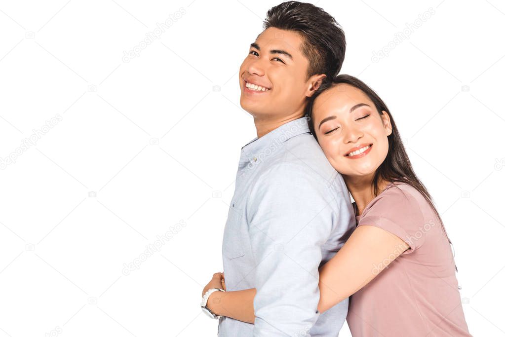 happy asian woman hugging handsome asian boyfriend isolated on white