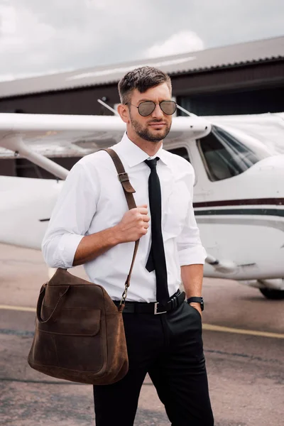 Confident Pilot Sunglasses Bag Standing Hand Pocket Plane — Stock Photo, Image