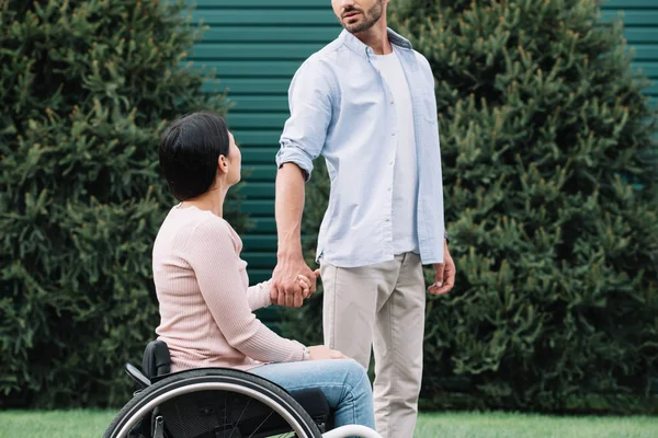 Cropped View Young Man Holding Hands Disabled Girlfriend While Walking — Stock Photo, Image