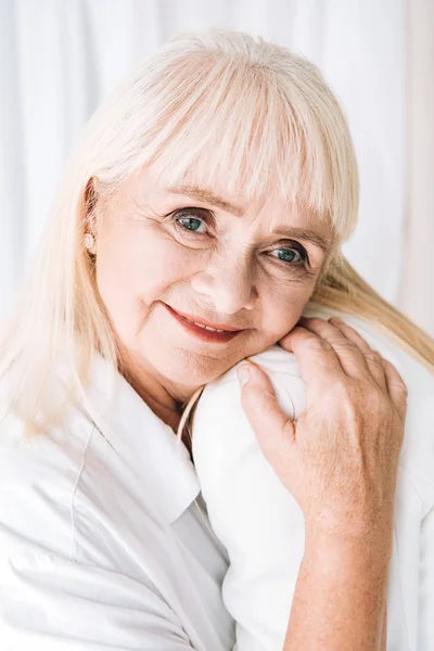 Blonde Smiling Grandmother Gently Embracing Granddaughter — Stock Photo, Image