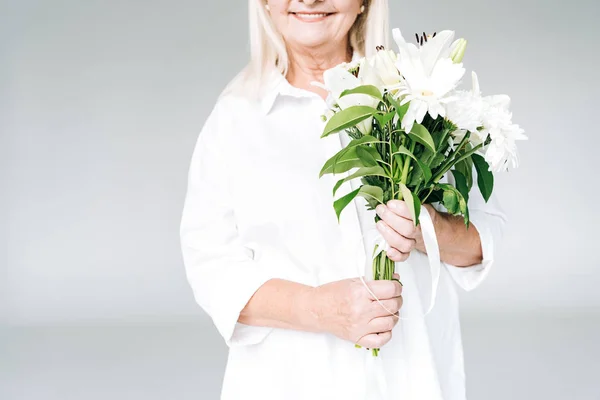 Cropped View Happy Blonde Senior Woman White Clothes Flowers Isolated — Stock Photo, Image