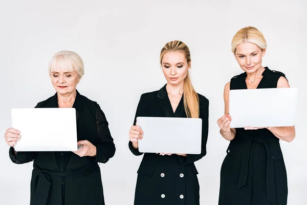 Fashionable Three Generation Blonde Businesswomen Total Black Outfits Laptops Isolated — Stock Photo, Image