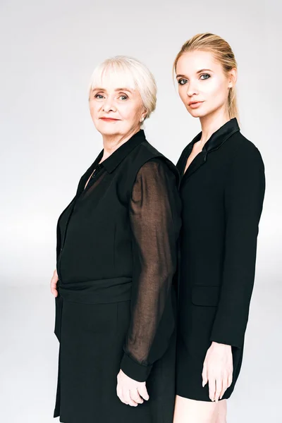 Elegant Blonde Granddaughter Grandmother Total Black Outfits Isolated Grey — Stock Photo, Image