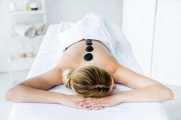 Woman Hot Stones Back Lying Massage Mat — Stock Photo, Image