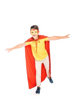 full length view of kid in mask and hero cloak isolated on white clipart